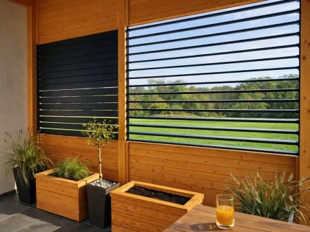 La véranda abritée du vent de Monique et Daniel