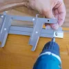 Facilité de fixation des mécanismes SUNDIY 20 mm en aluminium coloris RAL 9006 avec clips de fixation