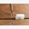 Pour fixer l'écart entre les lames de terrasse