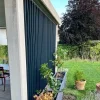 Brise vue équipé de mécanismes SUNDIY 20 mm et lames en aluminium coloris RAL 7016